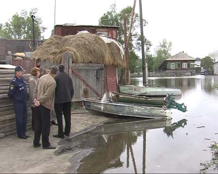 Новый подъем воды в верховьях Оби в минувшие выходные был вызван
дождями.